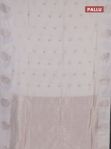 Semi chanderi saree cream with allover zari woven buttas and zari woven butta border