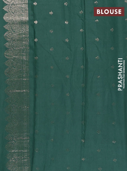 Semi chanderi saree green shade with allover zari woven buttas and zari woven butta border