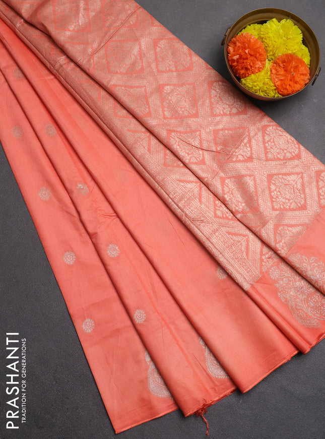 Semi chanderi saree peach orange with allover zari woven buttas and zari woven butta border