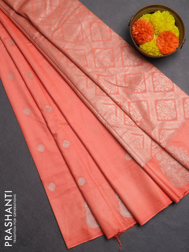 Semi chanderi saree peach orange with allover zari woven buttas and zari woven butta border
