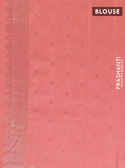 Semi chanderi saree peach orange with allover zari woven buttas and zari woven butta border