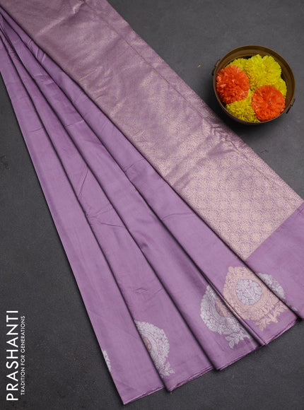 Semi chanderi saree lavender with plain body and zari woven butta border