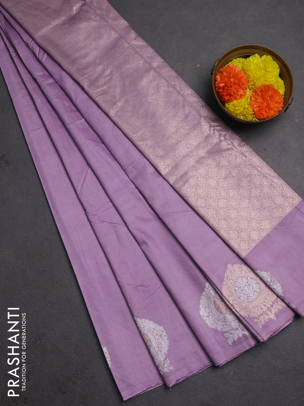 Semi chanderi saree lavender with plain body and zari woven butta border