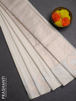 Semi chanderi saree off white with plain body and zari woven butta border