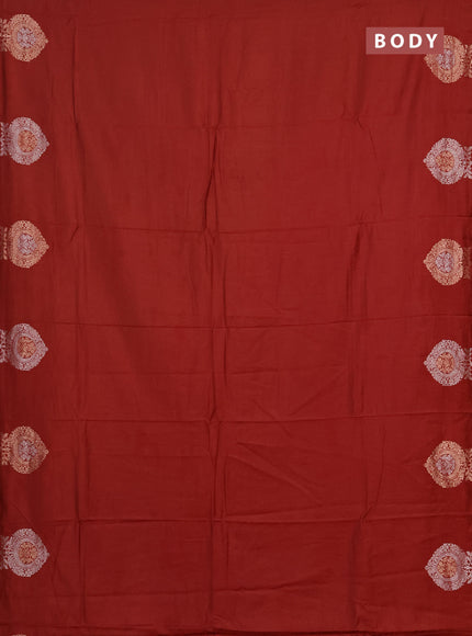 Semi chanderi saree rust shade with plain body and zari woven butta border