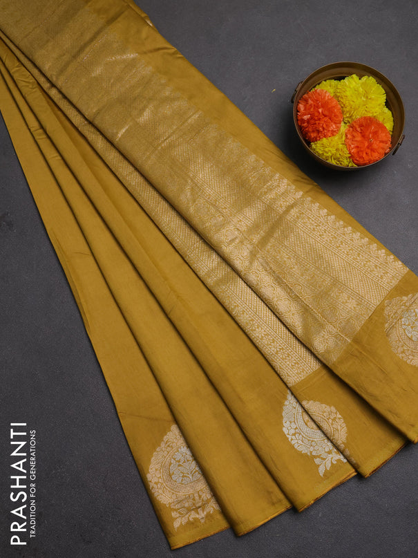 Semi chanderi saree mustard yellow with plain body and zari woven butta border