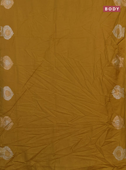 Semi chanderi saree mustard yellow with plain body and zari woven butta border
