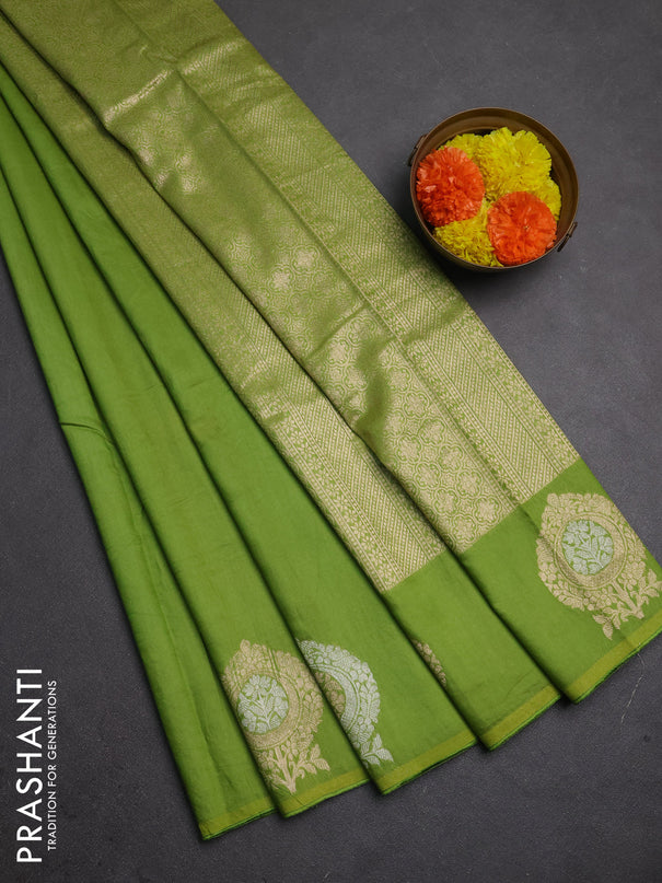 Semi chanderi saree light green with plain body and zari woven butta border