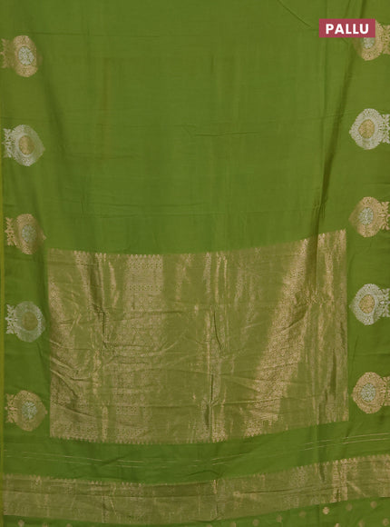 Semi chanderi saree light green with plain body and zari woven butta border