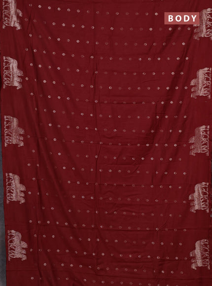 Semi chanderi saree maroon with allover zari woven buttas and zari woven border