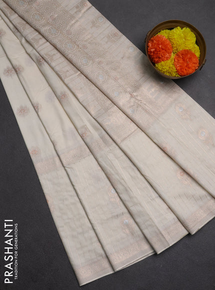 Semi chanderi saree off white with zari woven buttas and long zari woven border