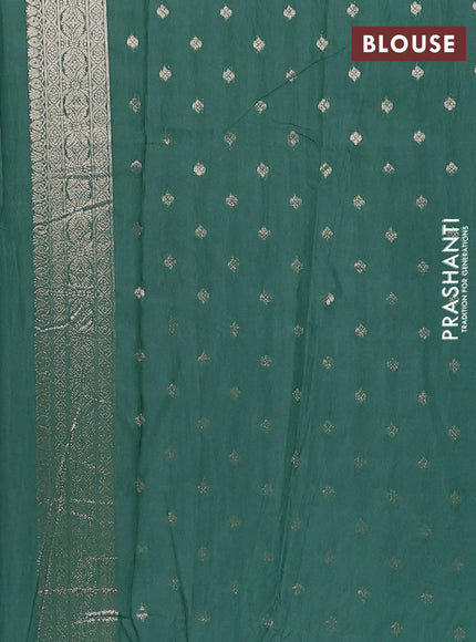 Semi chanderi saree green shade with zari woven buttas and zari woven butta border