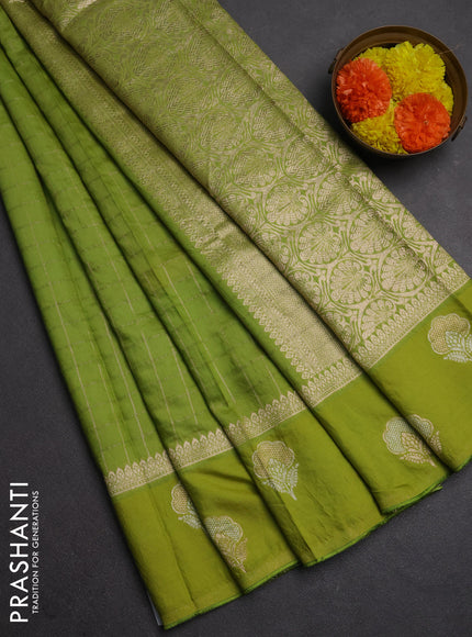 Semi chanderi saree light green with allover zari checked pattern and zari woven butta border