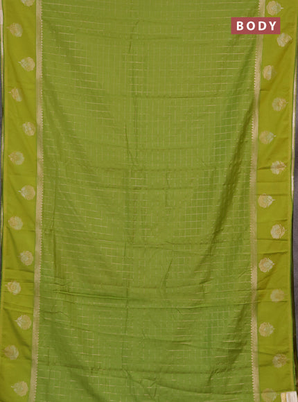 Semi chanderi saree light green with allover zari checked pattern and zari woven butta border