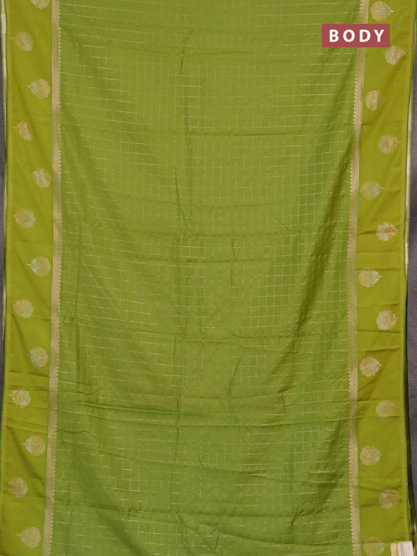 Semi chanderi saree light green with allover zari checked pattern and zari woven butta border