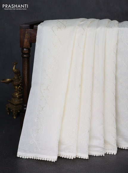 Mul chanderi saree cream with allover embroidery work and floral embroidery pallu