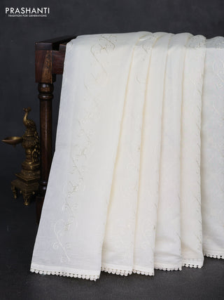 Mul chanderi saree cream with allover embroidery work and floral embroidery pallu
