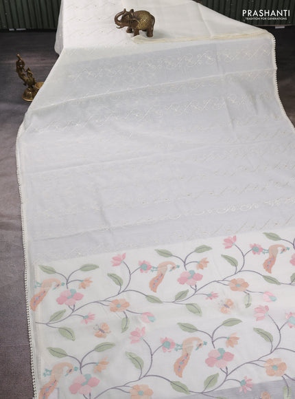 Mul chanderi saree cream with allover embroidery work and floral embroidery pallu