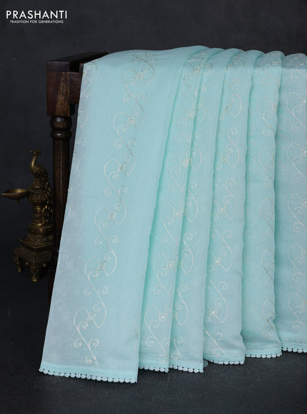Mul chanderi saree teal blue with allover embroidery work and floral embroidery pallu
