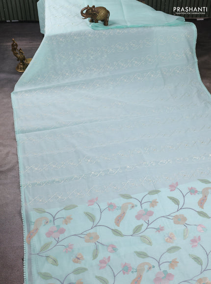 Mul chanderi saree teal blue with allover embroidery work and floral embroidery pallu