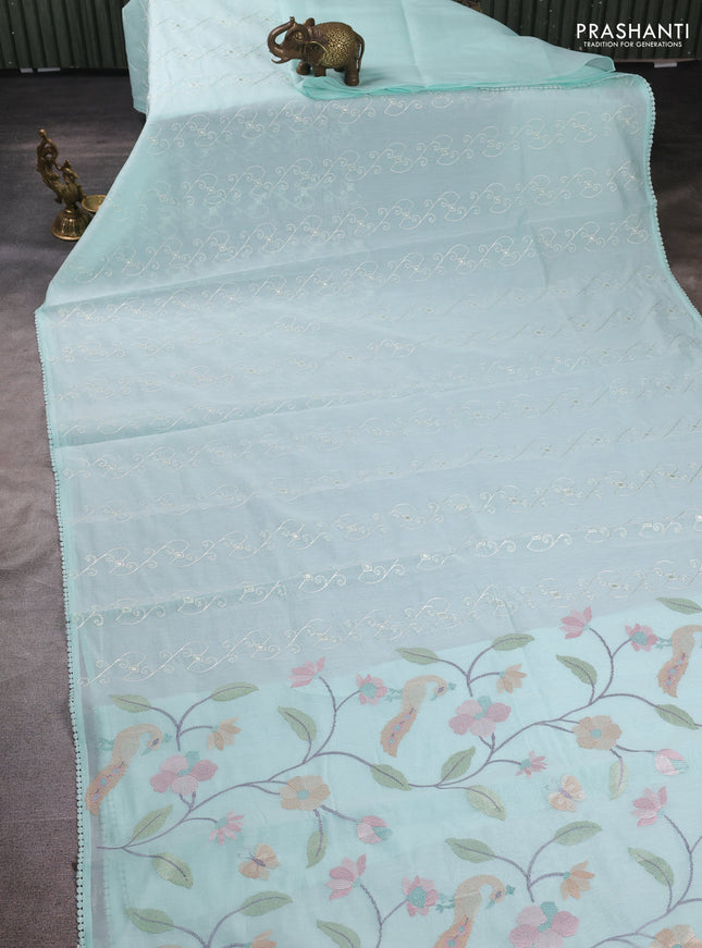Mul chanderi saree teal blue with allover embroidery work and floral embroidery pallu