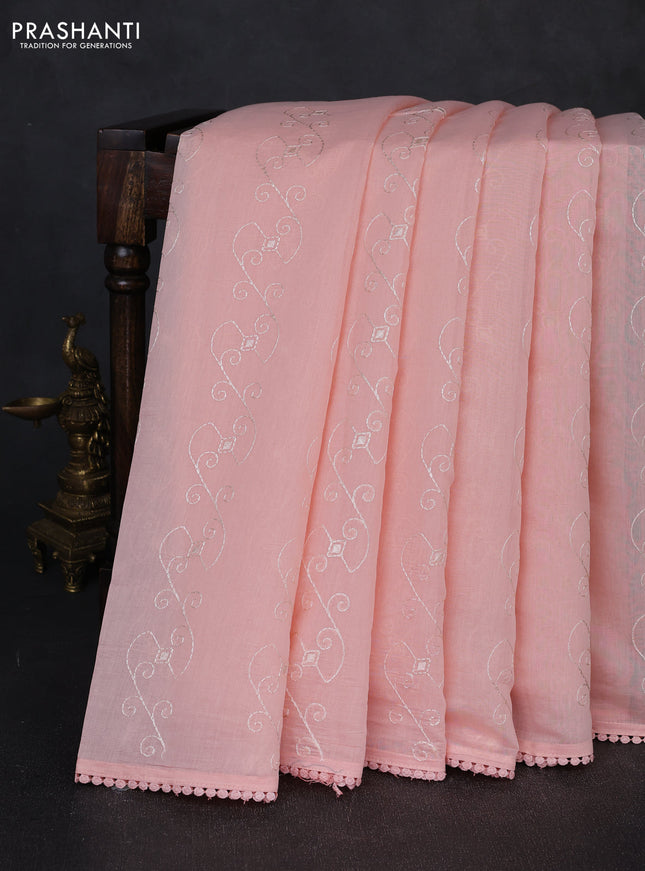 Mul chanderi saree peach shade with allover embroidery work and floral embroidery pallu