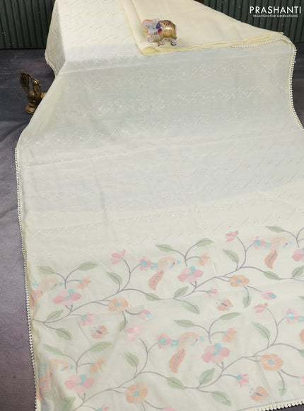 Mul chanderi saree pale yellow with allover embroidery work and floral embroidery pallu