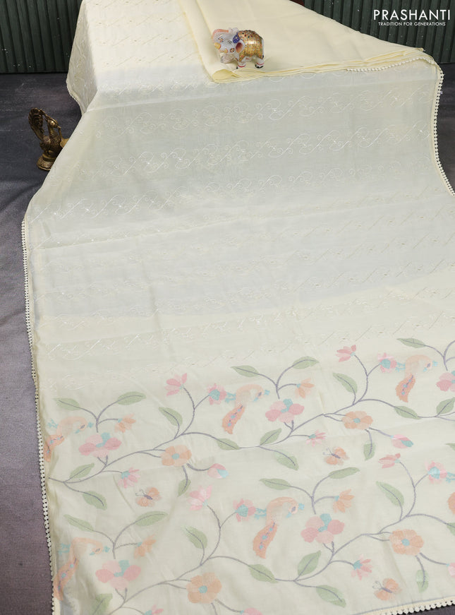 Mul chanderi saree pale yellow with allover embroidery work and floral embroidery pallu