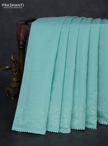Mul chanderi saree teal green shade with embroidery buttas and embroidery pallu