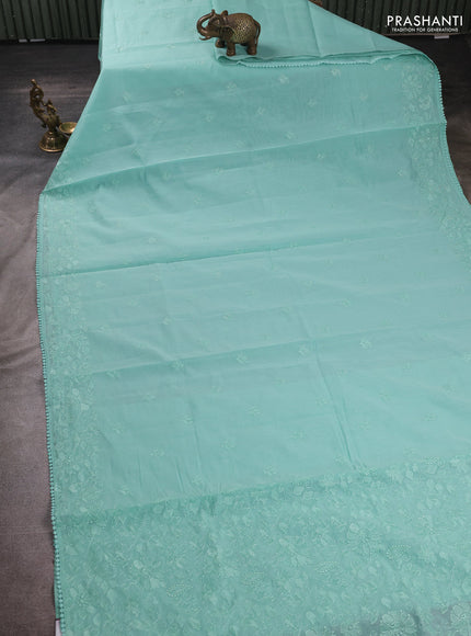 Mul chanderi saree teal green shade with embroidery buttas and embroidery pallu