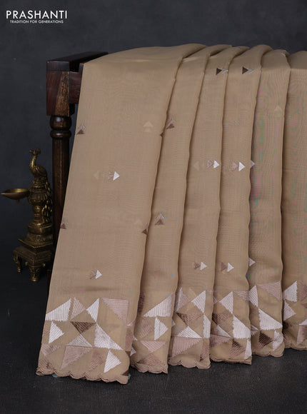 Mul chanderi saree beige with embroidery buttas and geometric design embroidery border