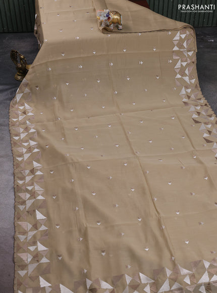 Mul chanderi saree beige with embroidery buttas and geometric design embroidery border