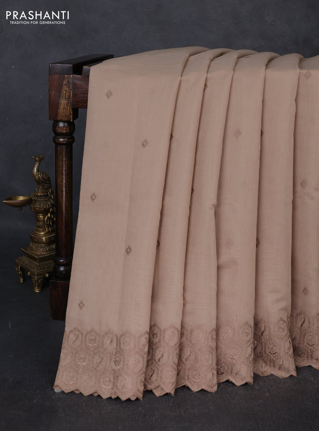 Mul chanderi saree dark beige with embroidery buttas and embroidery border