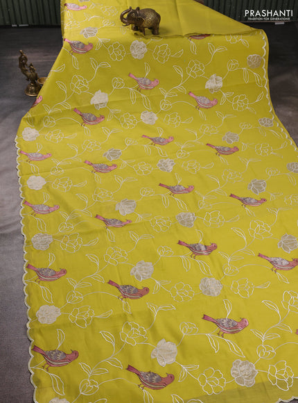 Mul chanderi saree yellow with allover embroidery work and scallop border