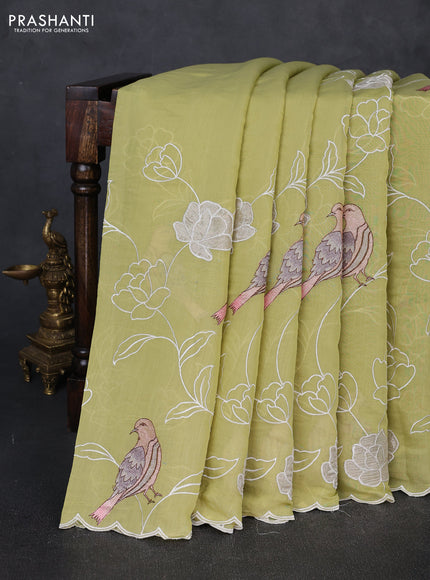 Mul chanderi saree pista green with allover embroidery work and scallop border
