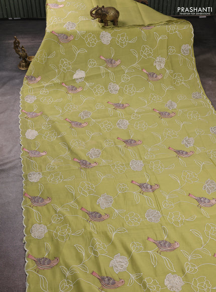 Mul chanderi saree pista green with allover embroidery work and scallop border