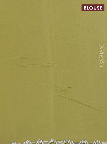 Mul chanderi saree pista green with allover embroidery work and scallop border