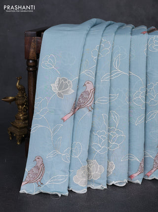 Mul chanderi saree pastel blue with allover embroidery work and scallop border