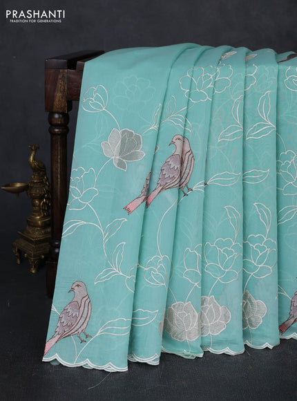 Mul chanderi saree teal blue with allover embroidery work and scallop border