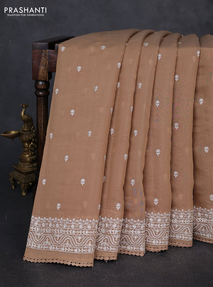 Mul chanderi saree dark beige with embroidery buttas and embroidery border