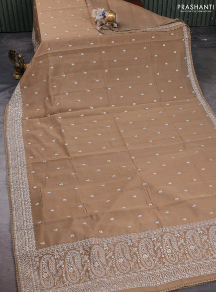 Mul chanderi saree dark beige with embroidery buttas and embroidery border