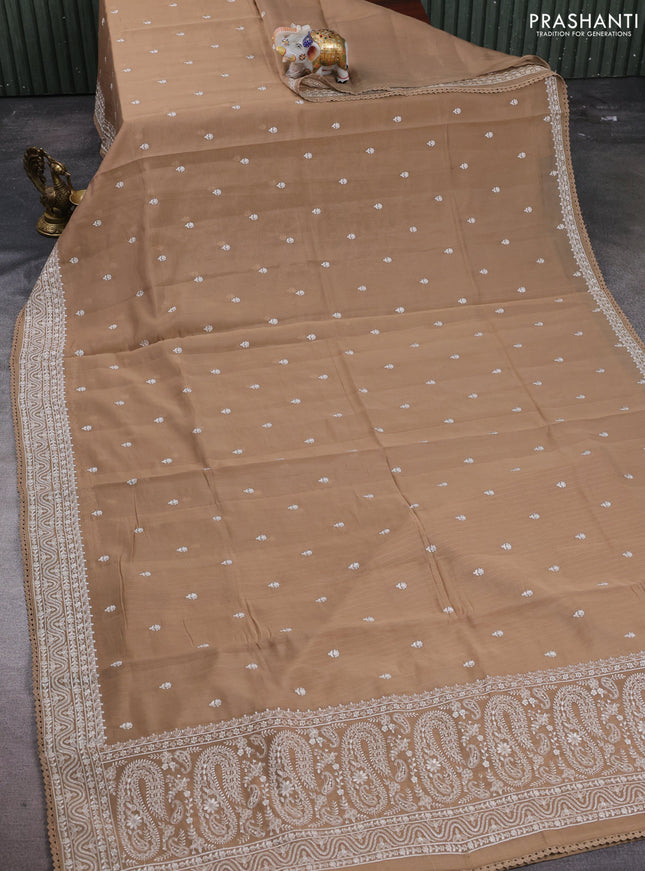 Mul chanderi saree dark beige with embroidery buttas and embroidery border
