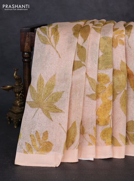 Pure linen silk saree pale orange with allover leaf digital prints and simple border