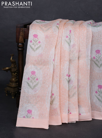 Pure linen silk saree pale orange with allover floral digital prints and simple border