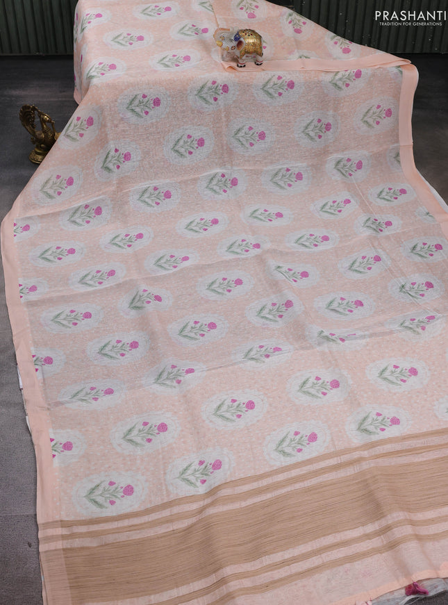 Pure linen silk saree pale orange with allover floral digital prints and simple border