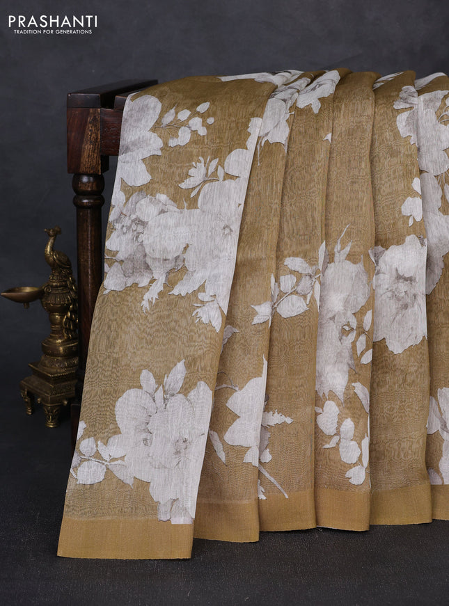 Pure linen silk saree dark mustard shade with allover floral digital prints and simple border