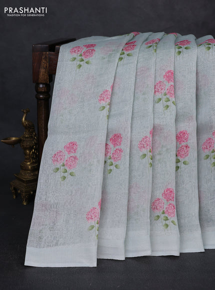 Pure linen silk saree mild teal with floral digital butta prints and simple border