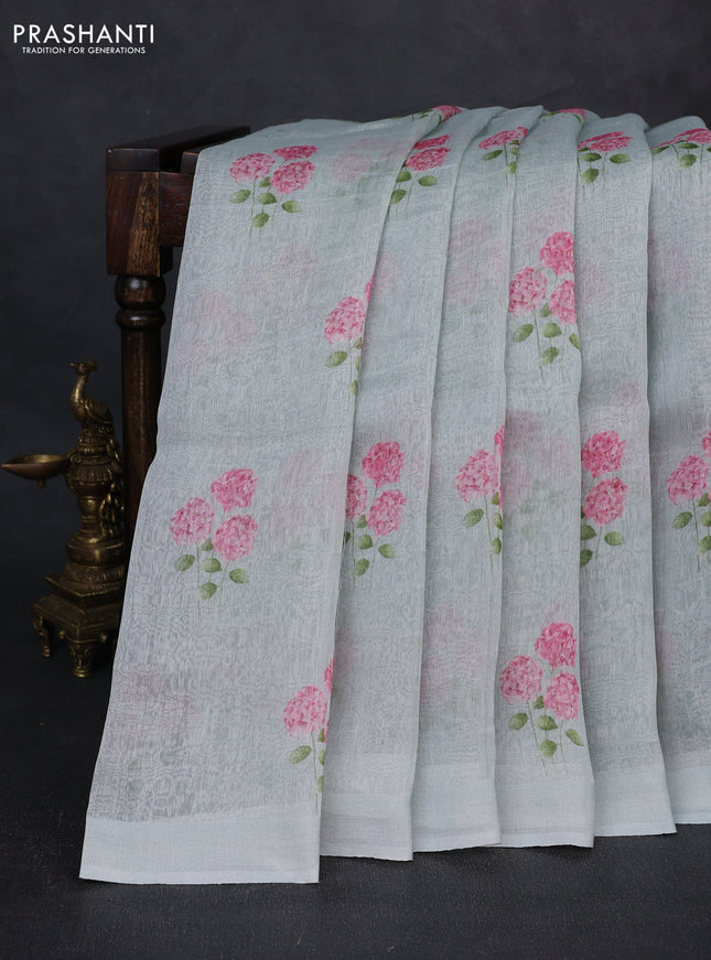 Pure linen silk saree mild teal with floral digital butta prints and simple border