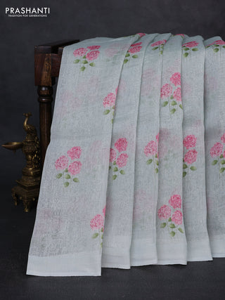 Pure linen silk saree mild teal with floral digital butta prints and simple border