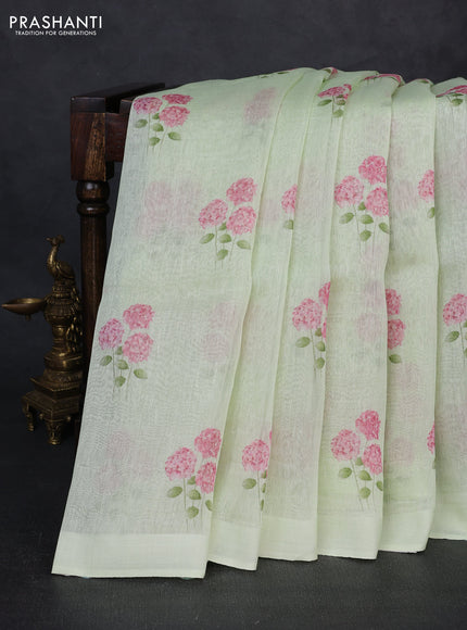 Pure linen silk saree pista green with floral digital butta prints and simple border